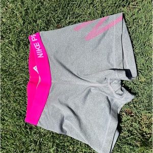 adult small nike pros. worn twice. good condition